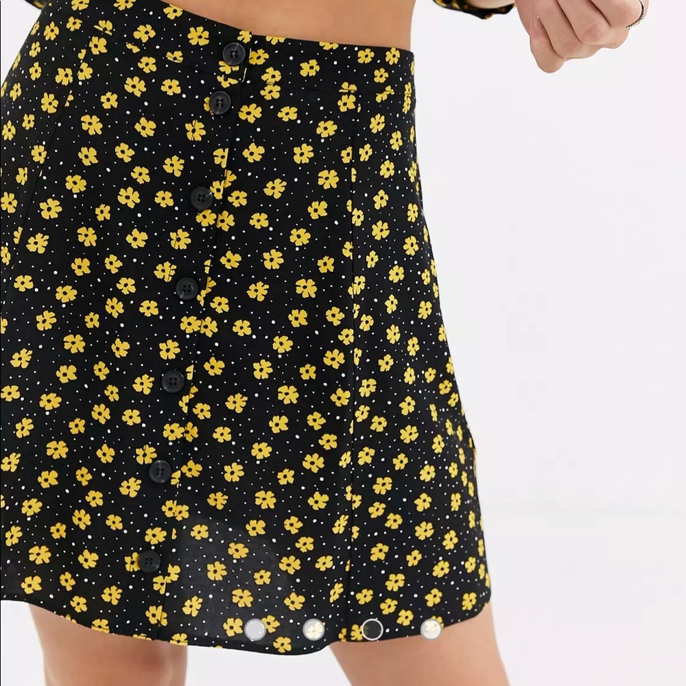 Black & yellow floral mini skirt